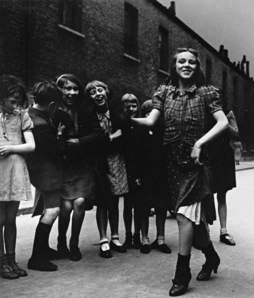 East End girl dancing the Lambeth Walk.