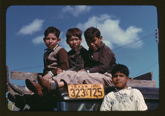 Boys sitting on truck parked at the FSA ... labor camp, Robstown, Tex.