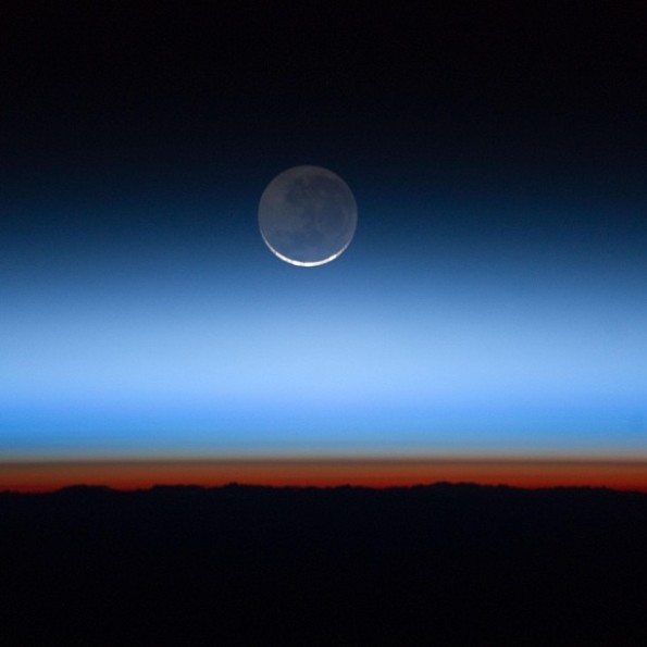 NASA Moon Over Earth Seen From ISS