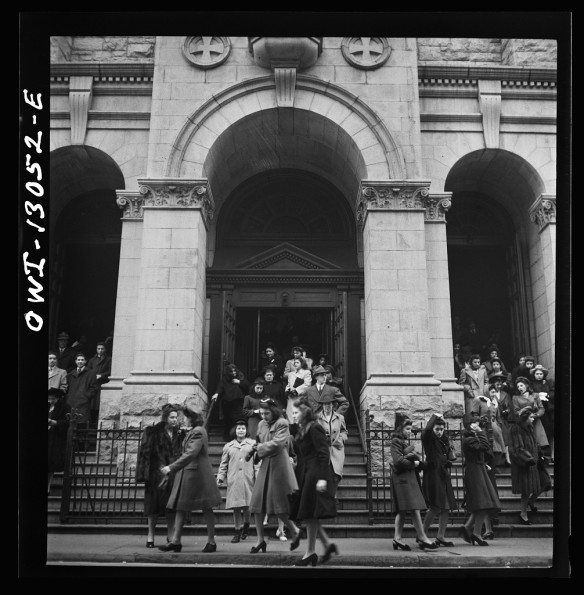 New York, New York. Italian-Americans coming out of Saint Dominick's church on Sullivan Street on New Year's Day