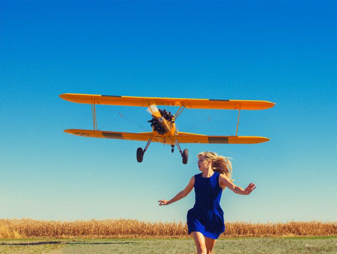 Girl-running-from-plane