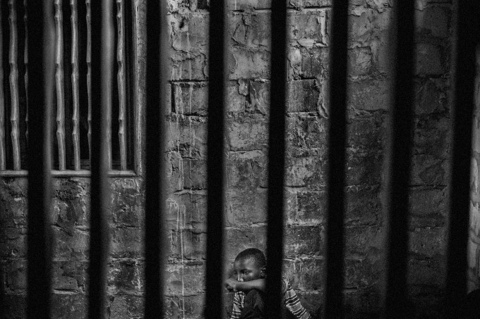 Abdoulaye, 15, imprisoned in one room of a daara in the Diamaguene area, city of Thies, Senegal, May 18, 2015. The rooms have windows with security bars to keep the talibes from running away.