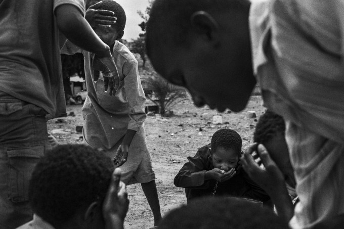 Children that used to be talibes cool off at SOS Talibe Center in Bafata, Guinea-Bissau, June 8, 2015. The Center received 45 cases of talibes returning from Senegal in 2014, some of them ran away from the daaras but others were handed over by the marabouts to the authorities when some of them were brought to the courts.