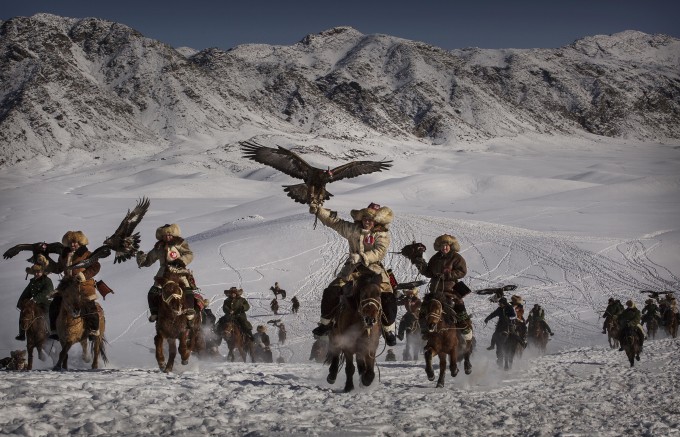 on January 30, 2015 in Xinjiang, China. The Eagle Hunting festival, organised by the local hunting community, is part of an effort to promote and grow traditional hunting practices for new generations in the mountainous region of western China that borders Kazakhstan, Russia and Mongolia. The training and handling of the large birds of prey follows a strict set of ancient rules that Kazakh eagle hunters are preserving for future generations.