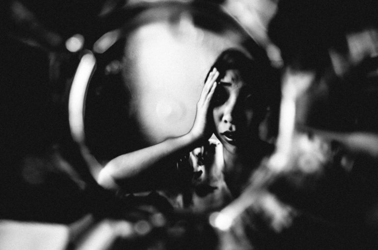 eric-kim-photography-cindy-project-black-and-white-11-stress-anxiety-hand-glass