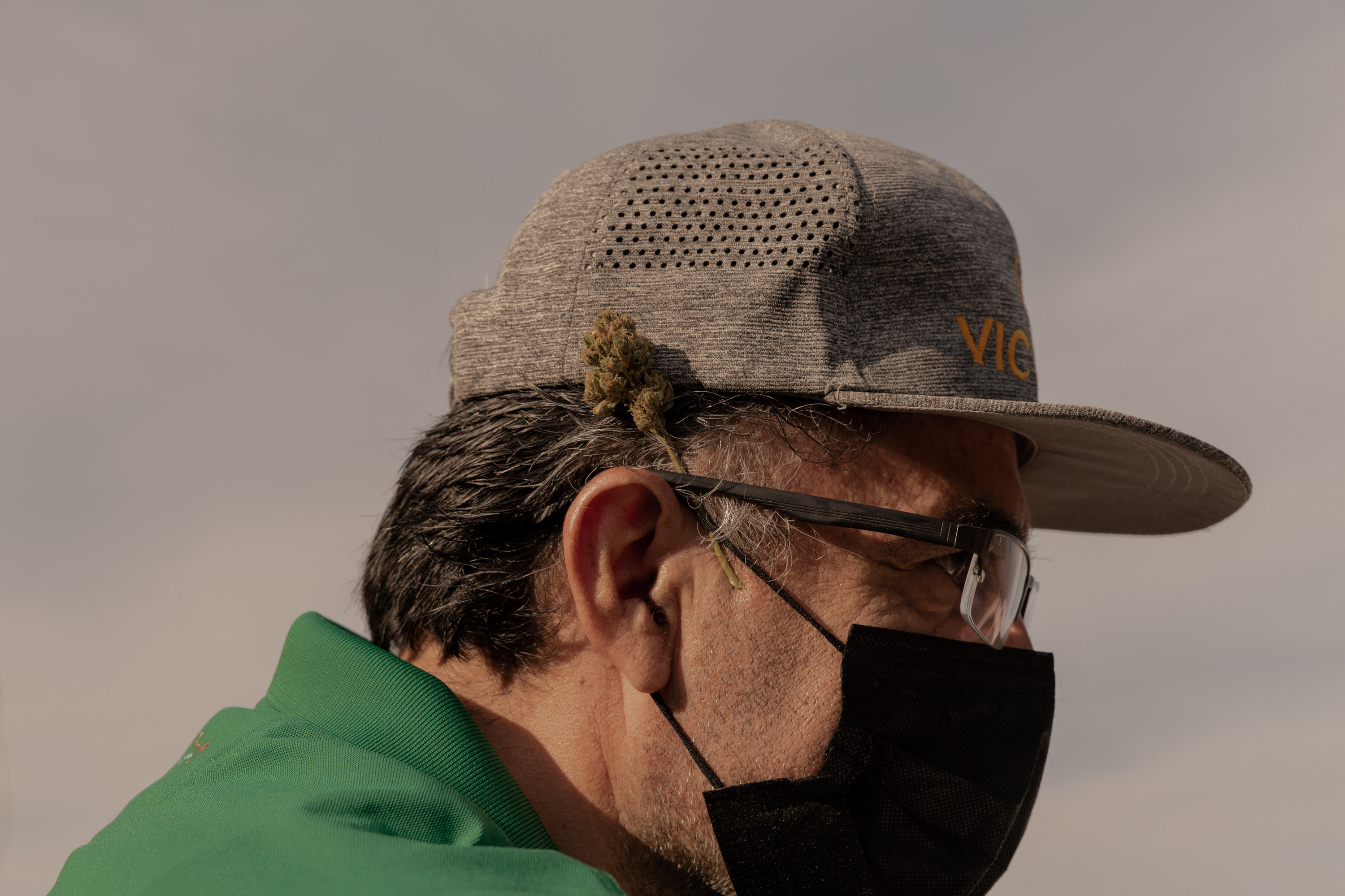 Benito Contreras with a marijuana bud behind his ear.