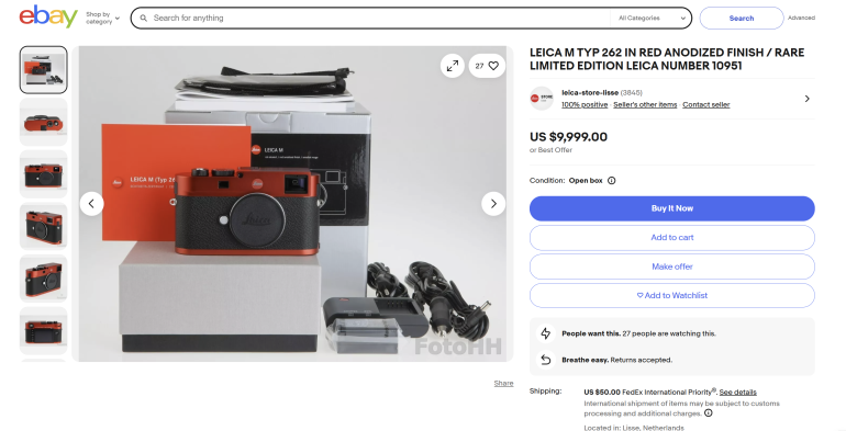 Leica M Typ 262 red anodized camera with box, manual, charger, and cables displayed on eBay listing page.