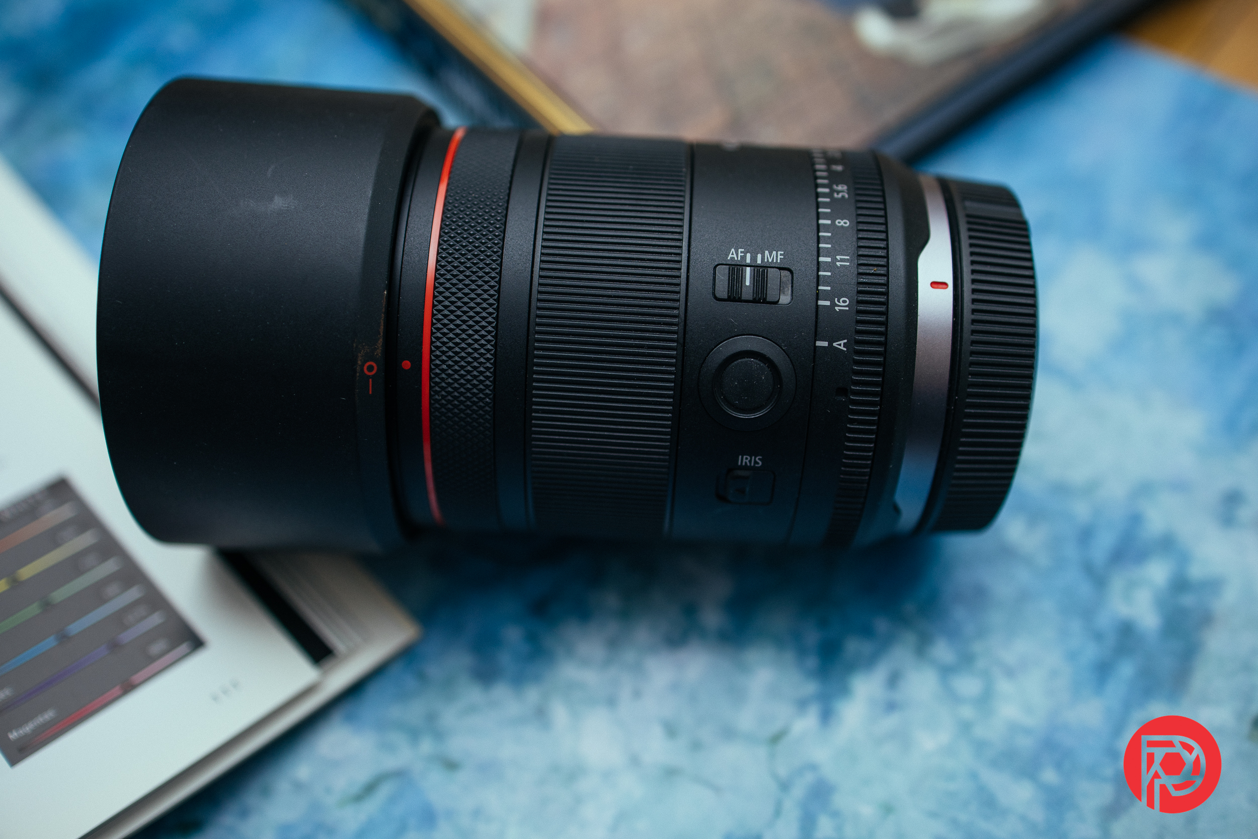 Will Canon Introduce a VCM Lens for Portrait Photographers? Product image: Canon RF 50mm F1.4 L VCM profile view with AF/MF switch, Function Button, and Iris Lock switch shown.