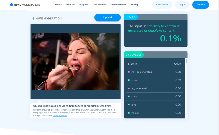 A woman eats food from a fork, featured in an AI content moderation tool interface showing analysis results.