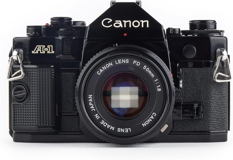 Front view of a black Canon A-1 film camera with a Canon 50mm lens attached.