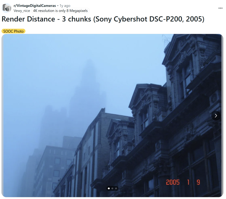 Foggy cityscape with old buildings and a tall, blurry skyscraper in the background, dated January 9, 2005.