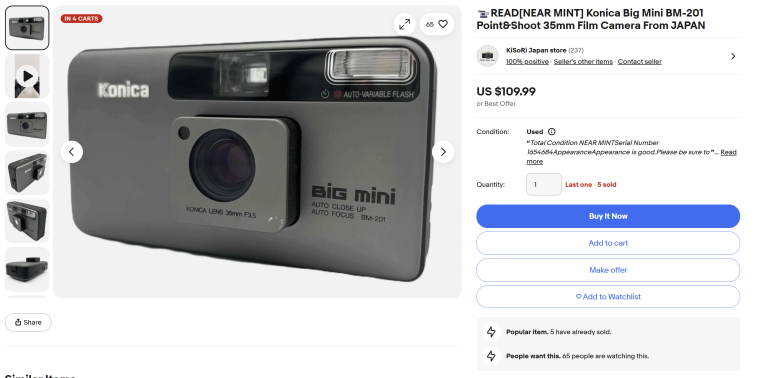 Konica Big Mini BM-201 35mm film camera on an eBay listing page with price and purchase options visible.