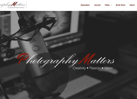 A close-up of a microphone in a recording setup, with Photography Matters logo and website menu at the top.