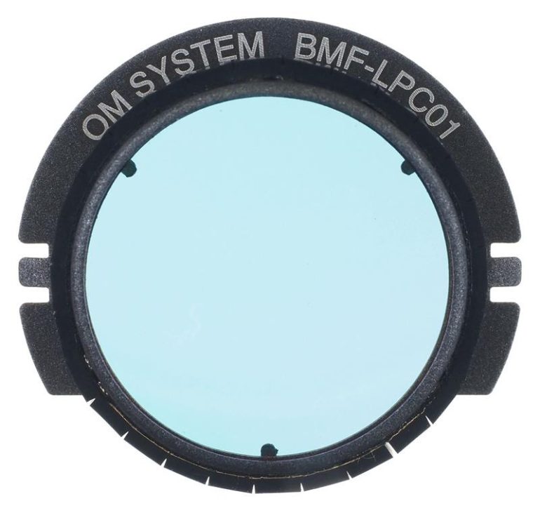 A circular blue camera filter labeled OM SYSTEM BMF-LPC01 against a white background.