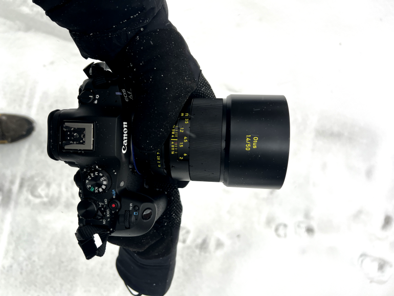 A person holding a camera.