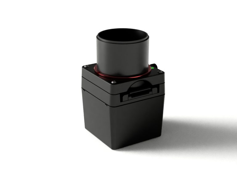 A black electronic device with a cylindrical top and a square base, photographed on a white background.