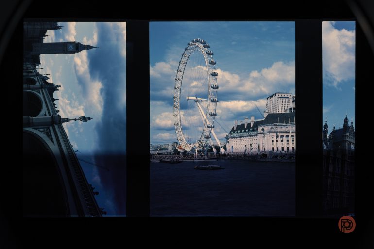 Split image with London Eye in the center, Big Ben and bridge tilted on the left, and buildings on the right.