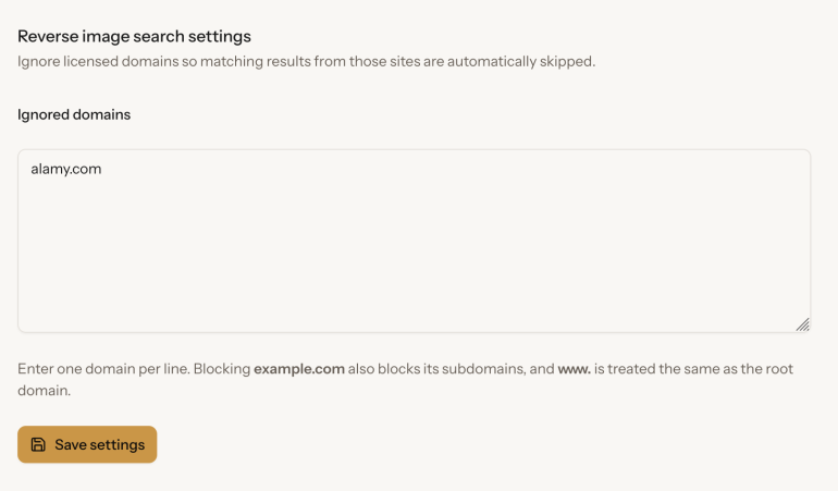 Settings page for reverse image search, showing alamy.com entered in the Ignored domains text box.