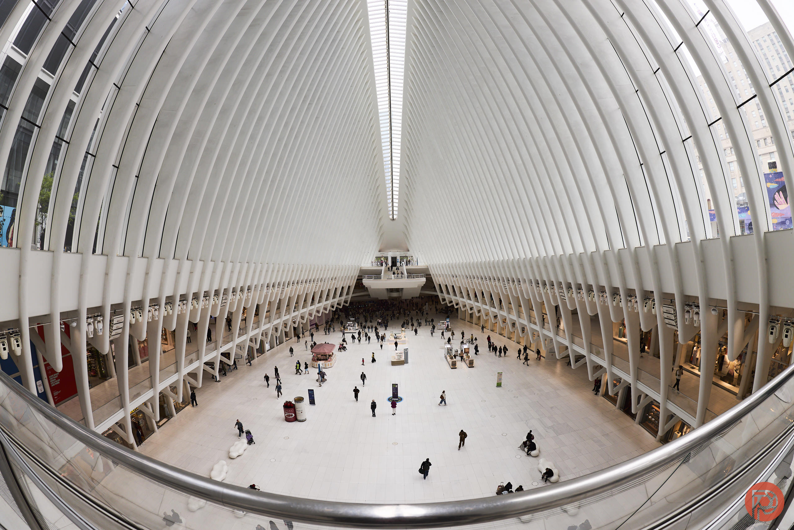 Our Retro Digital Presets are One of Our Best Buys Interior of the Oculus transportation hub with people walking on the white floor under its ribbed white ceiling.