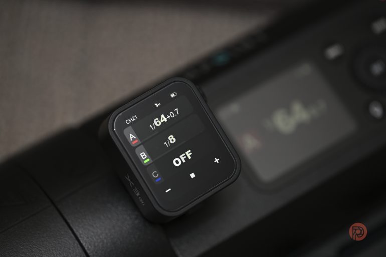 Close-up of a digital device screen displaying settings for channels, power, and mode; OFF is highlighted.