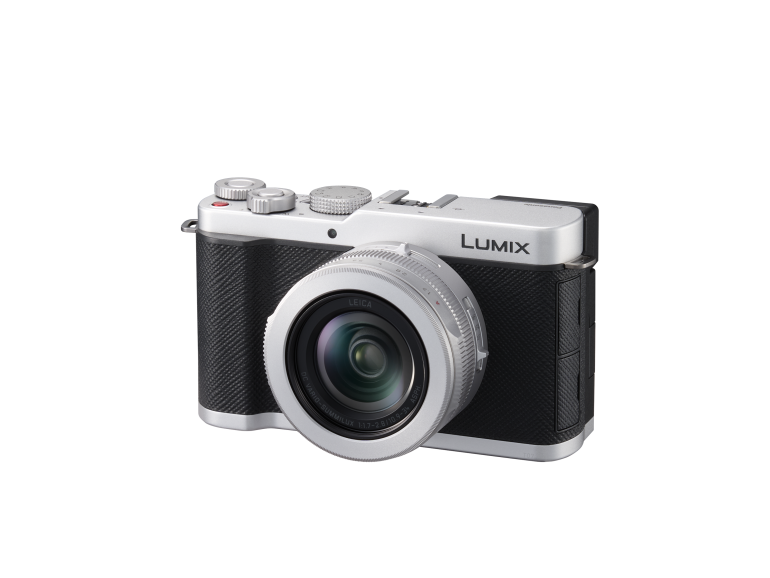 A silver and black Lumix digital camera with a large lens, shown on a plain white background.