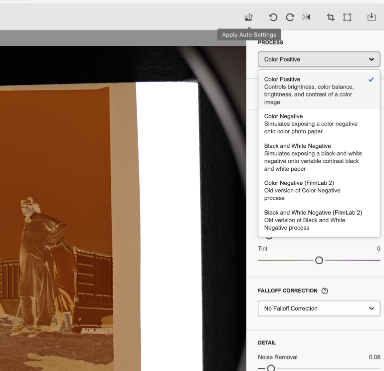 Photo editing software interface with a vintage photo and color processing options displayed on the right panel.