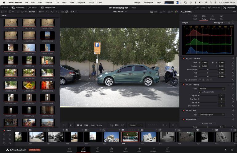 Editing software displaying a photo of a green car parked on a street with trees and a P sign.