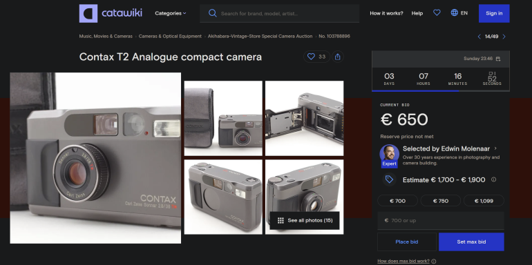 Auction page showing a Contax T2 analogue compact camera with multiple close-up photos and a price of €650.