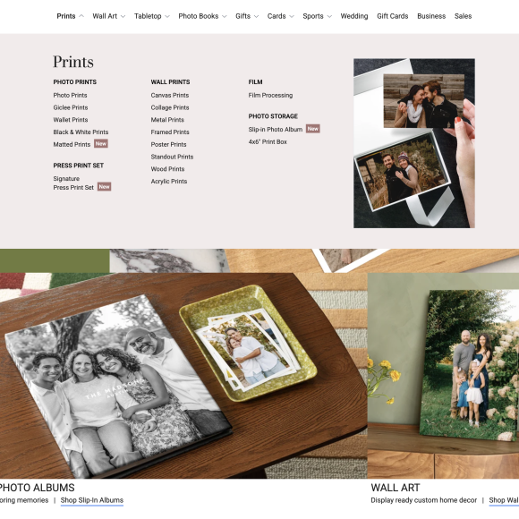 A website page displays photo print options, photo albums, and custom wall art with family photo examples.