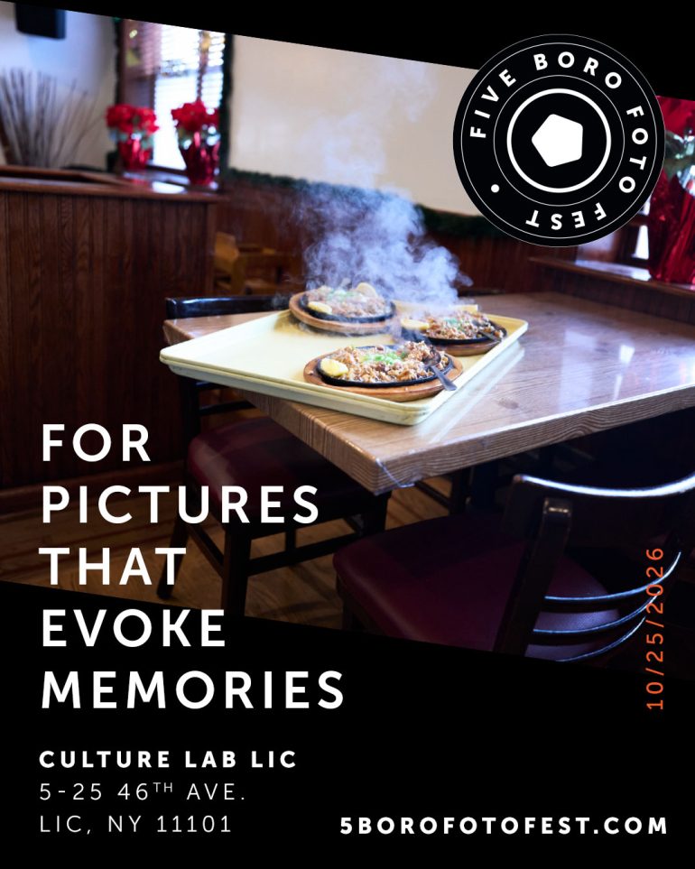 A table with steaming dishes in a restaurant, with Five Boro Foto Fest and event details displayed.