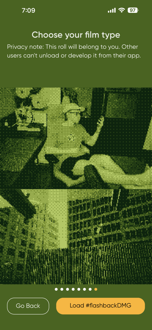 A phone screen showing a film selection app with vintage-style photos and buttons to go back or load film.
